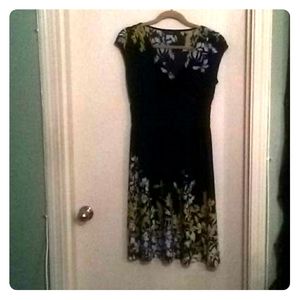 Black cap sleeve dress green purple white flowers